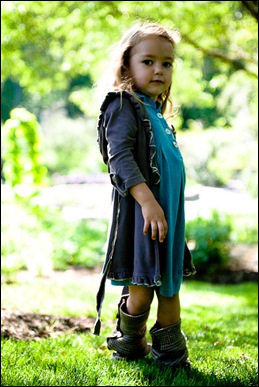 little girl posing for photograph at brookside gardens in maryland