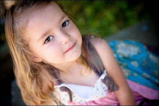 little girl posing for photograph at brookside gardens in maryland