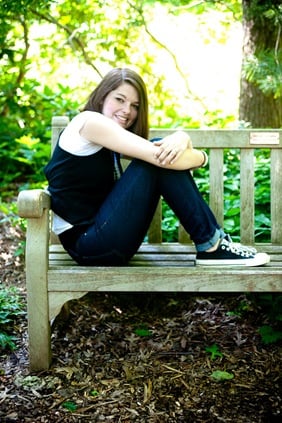 woman on bench  at Brookside Gardens in Wheaton MD