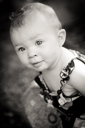 baby on turtle sculpture at allens pond in bowie md