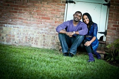 man and woman sitting on stoop in old town alexandria