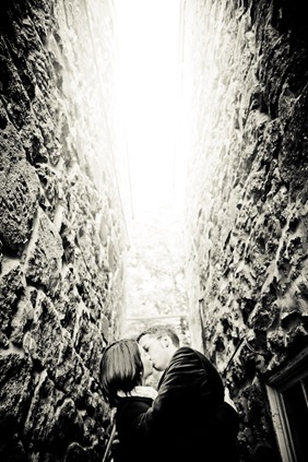 man and woman in Ellicott City kissing in stairwell