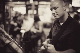 Randy Morser playing guitar in annapolis bar