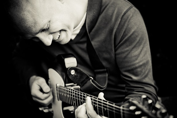 Randy Morser playing guitar