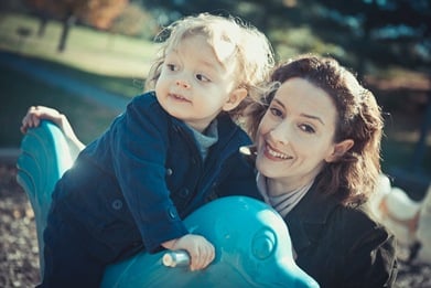 Mother and son playing at playground in Derwood Maryland