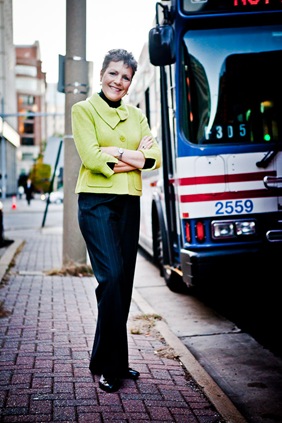 woman standing in front of metrobus in fairfax va