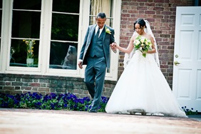 bride walking down isle at the Newton White Mansion in Mitchellville MD