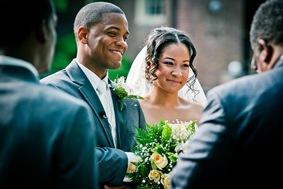bride and groom at the alter  at the Newton White Mansion in Mitchellville MD