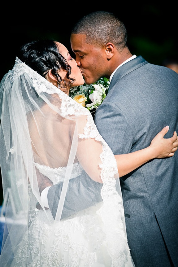 bride and groom kissing  at the Newton White Mansion in Mitchellville MD