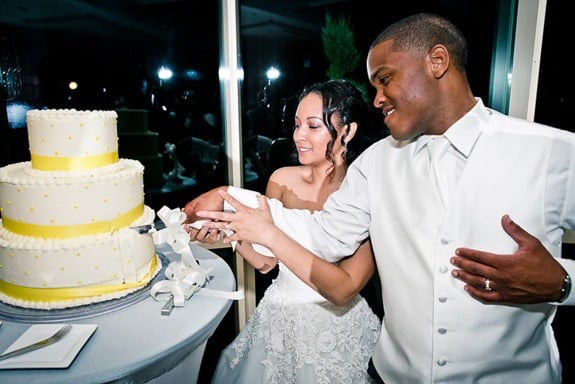 bride and groom cutting cake  at the Newton White Mansion in Mitchellville MD