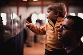 Boy looking at toy trains at Baltimore & Ohio Railroad Museum
