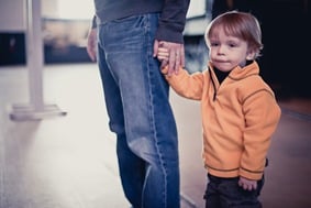 boy standing with father at Baltimore & Ohio Railroad Museum