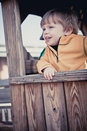 boy playing on toy train at Baltimore & Ohio Railroad Museum