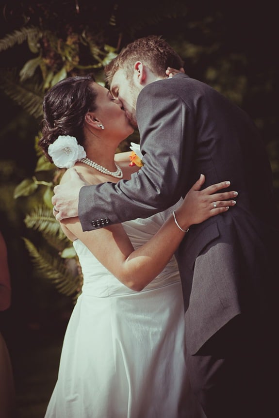 bride and grooms first kiss at Mt. Airy Mansion in Upper Marlboro Maryland
