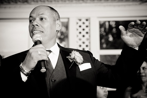 father saying dinner blessing at Mt. Airy Mansion in Upper Marlboro Maryland