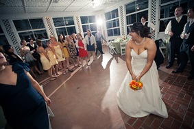 bride tossing flowers at Mt. Airy Mansion in Upper Marlboro Maryland