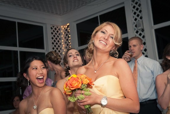 bridesmaid with caught wedding bouquet at Mt. Airy Mansion in Upper Marlboro Maryland