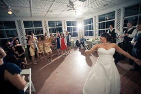 bride tossing flowers at Mt. Airy Mansion in Upper Marlboro Maryland