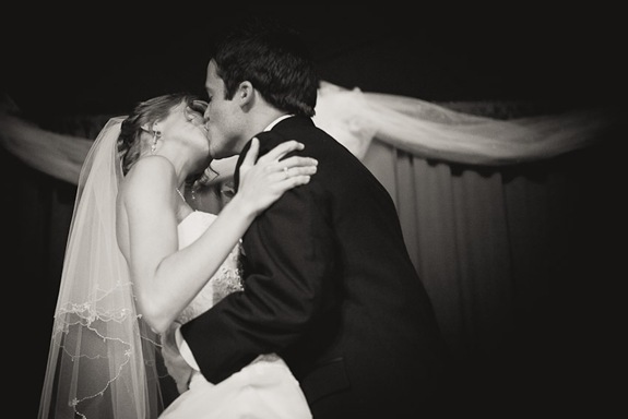 Bride and groom first kiss during ceremony in Mechanicsville MD