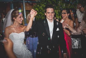 bride and groom depart the wedding