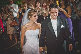 bride and groom depart the wedding