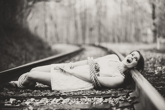 The Villain Ties the Maden to the Tracks  Engagement Session
