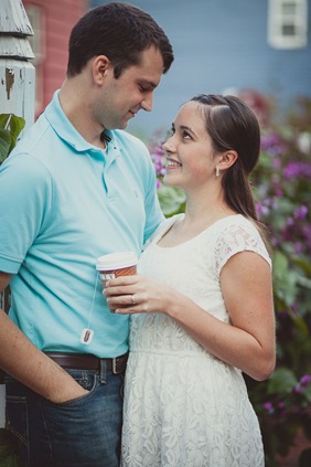 Engaged couple buying ice cream and coffee on a date