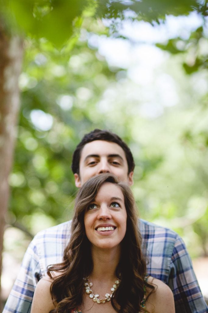 cute-couple-peaking-over-head-great-falls-maryland