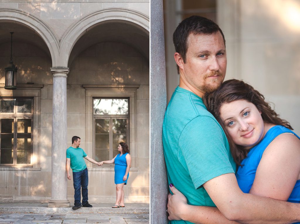 A couple embracing in front of a building.