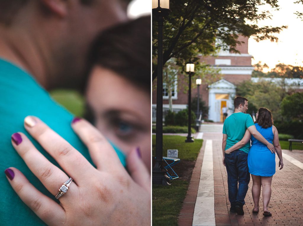 A couple holding hands on a sidewalk.