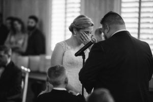 A bride is crying during her Maryland wedding ceremony.