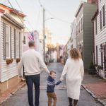 A family walks down a downtown street in Annapolis, creating a picturesque portrait of smalltown life.