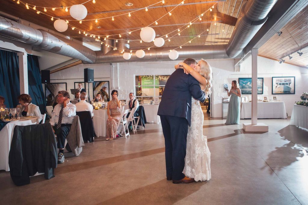A bride and groom sharing their first dance at the Annapolis Maritime Museum wedding reception in Annapolis, Maryland.