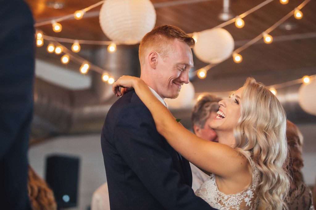 A bride and groom sharing their first dance at the Annapolis Maritime Museum.