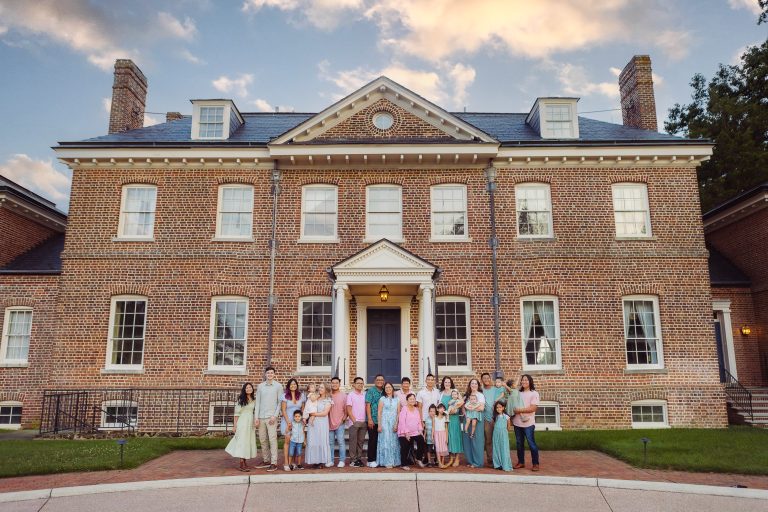 A group of bridesmaids posing in front of Belair Mansion in Maryland.