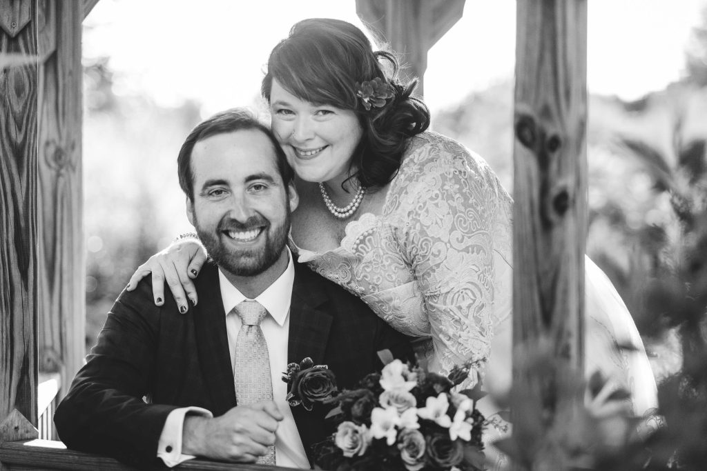A black and white photo of a bride and groom in Cylburn Arboretum.