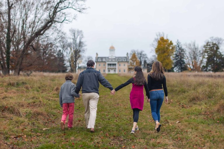 A family walks through Hampton Mansion in Maryland.