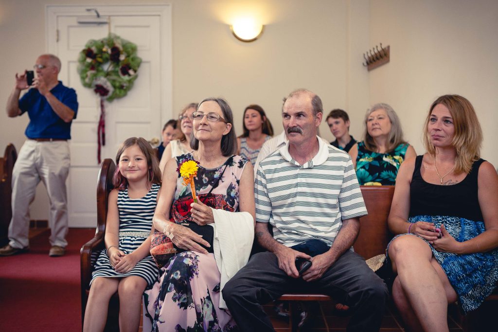 A group of people sitting in a church in Annapolis, Maryland.