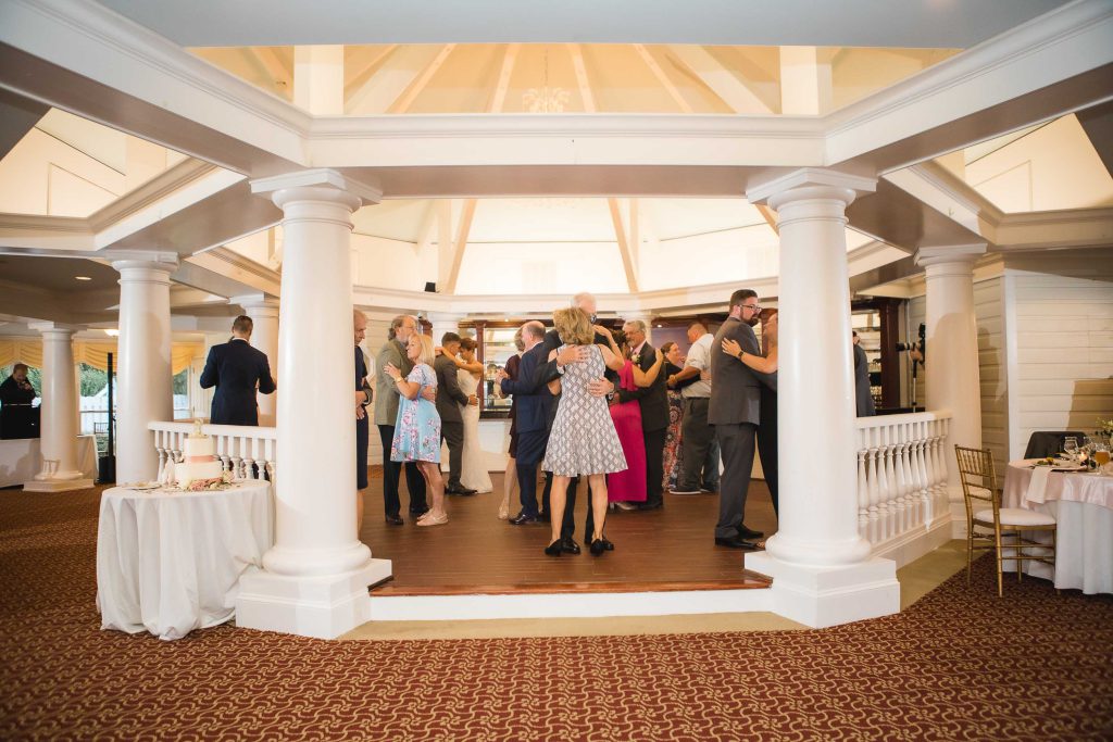 A group of people dancing in a large room at Kent Island Resort in Stevensville, Maryland.