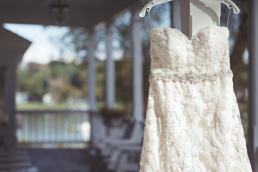 A wedding dress hanging on a porch in Stevensville, Maryland.