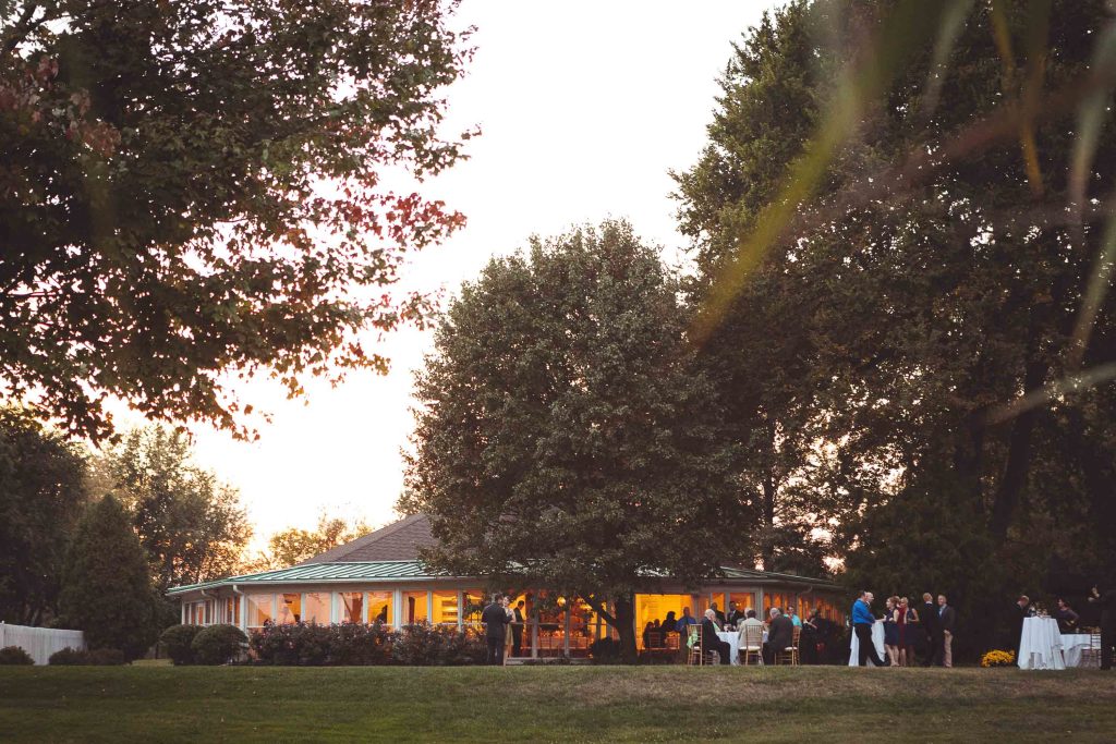 A wedding reception at Kent Island Resort in Stevensville, Maryland with trees in the background.