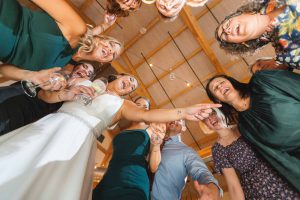 A group of bridesmaids posing for a District Remix photo.