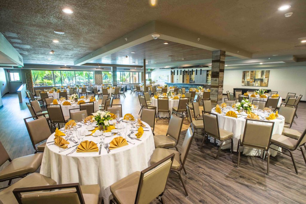 A banquet room at Turf Valley Resort in Ellicott City, Maryland equipped with tables and chairs.
