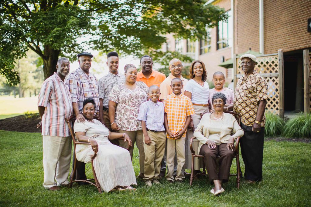 A family posing for a photo at Turf Valley Resort in Maryland.