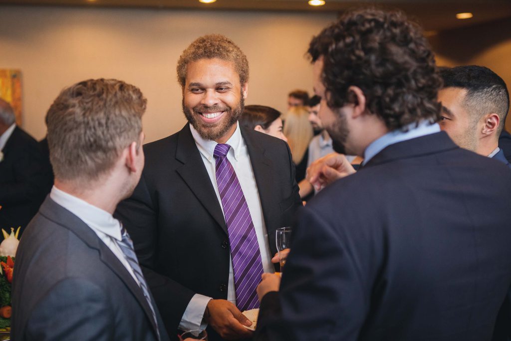 A group of men and women at a business event held at Turf Valley Resort in Ellicott City, Maryland.