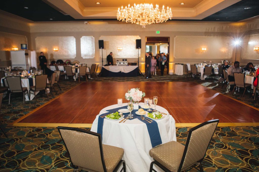 A wedding reception at Turf Valley Resort in Ellicott City, Maryland, with tables and chairs.