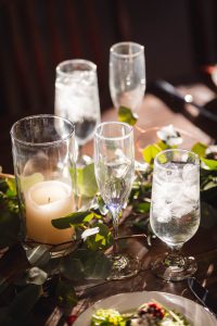 A candle centerpiece at an event vendor booth.