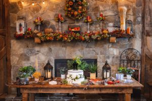 A table with a cake and decorations, perfect for an event vendor at Vows & Vines.