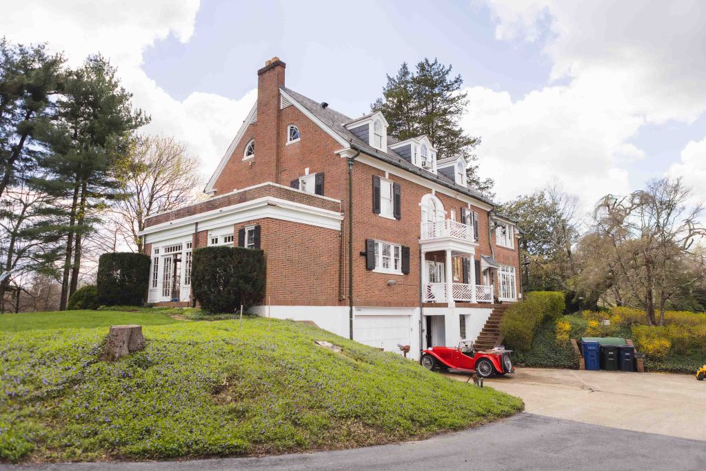 A brick home with wedding details.