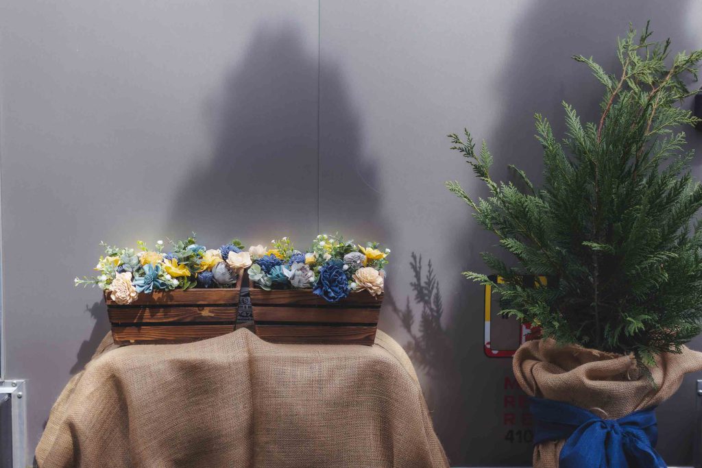 A table with details of plants placed for a wedding.